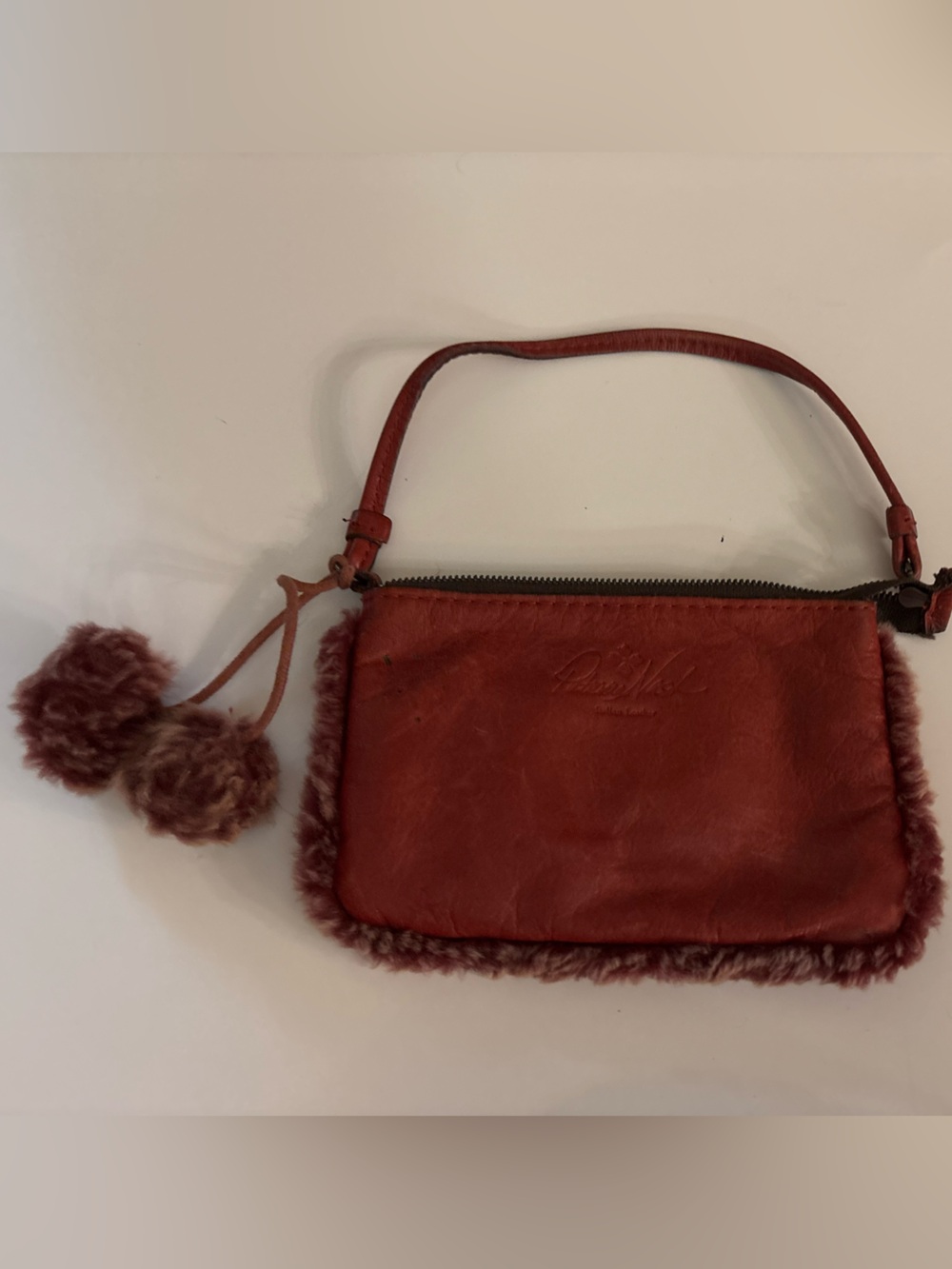 Patricia Nash Rust Red Leather Wristlet with Faux Fur Trim and Pom-Poms